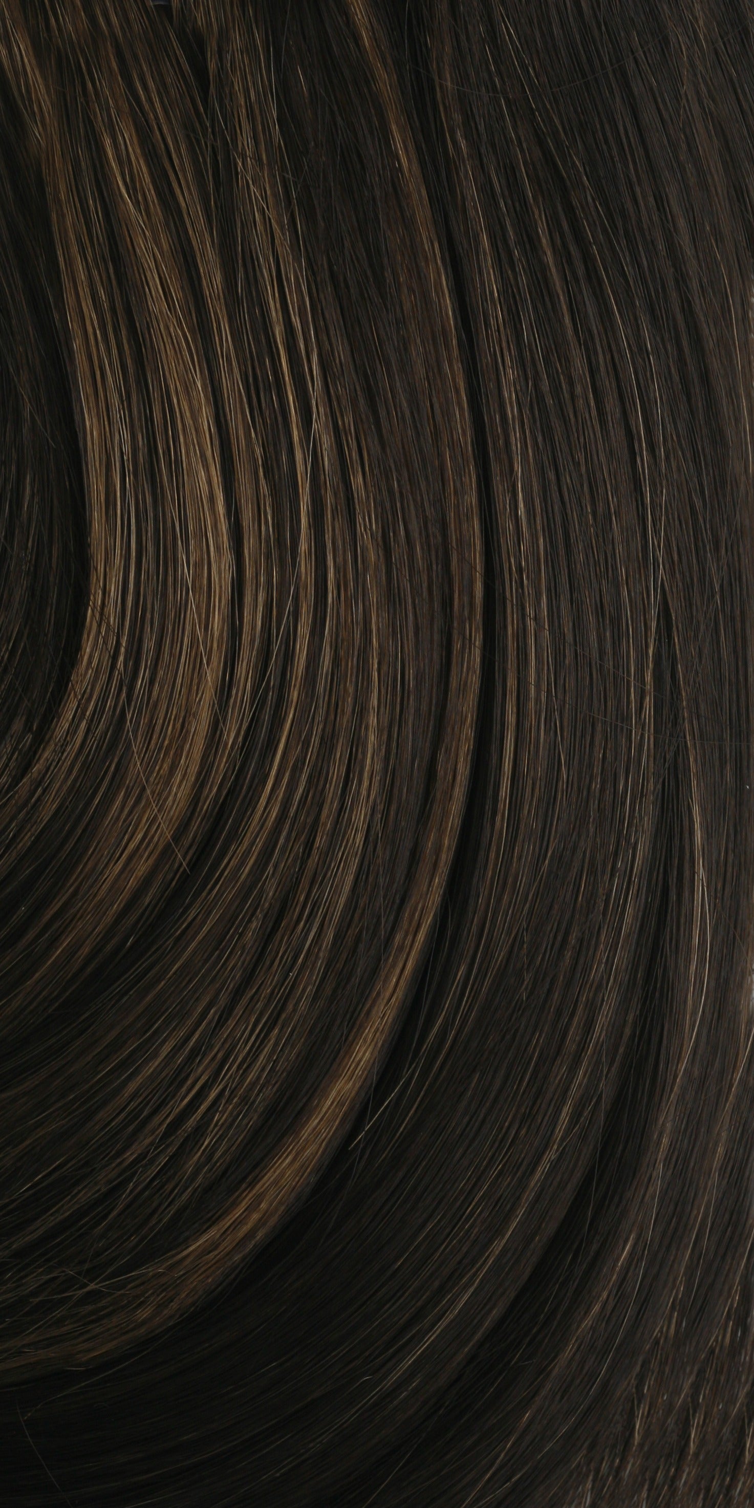 SHAKE N GO golden human hair wig close up showing dark brown strands with subtle golden highlights and smooth texture