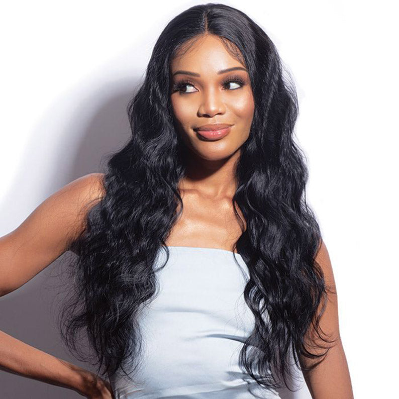 Shake N Go virgin remy hair body wave long natural black waves with middle part on model wearing light blue top