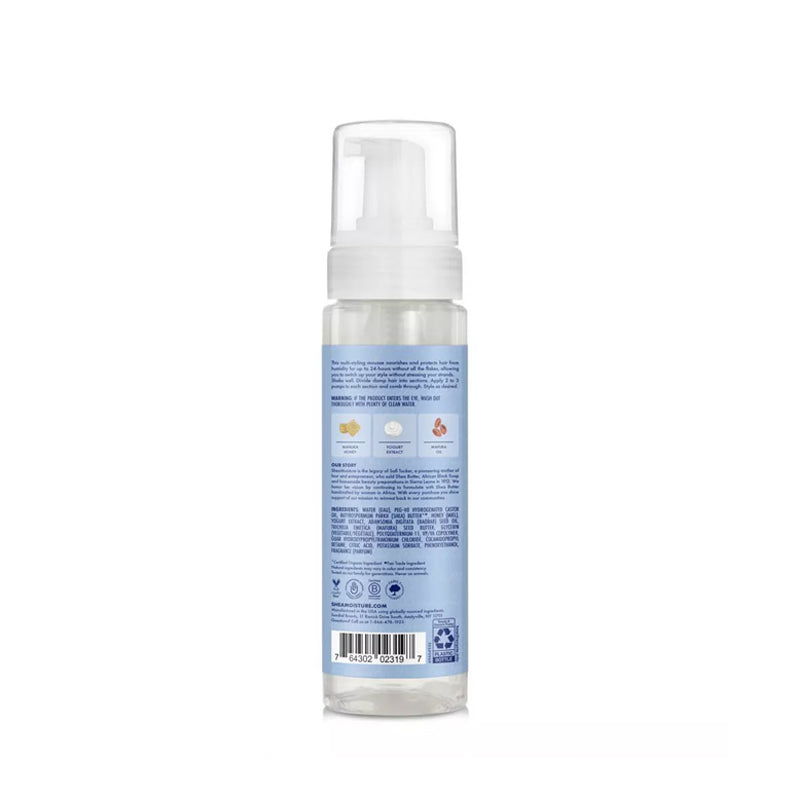 Back view of Shea Moisture Manuka Honey mousse clear pump bottle with blue ingredient label for hair care