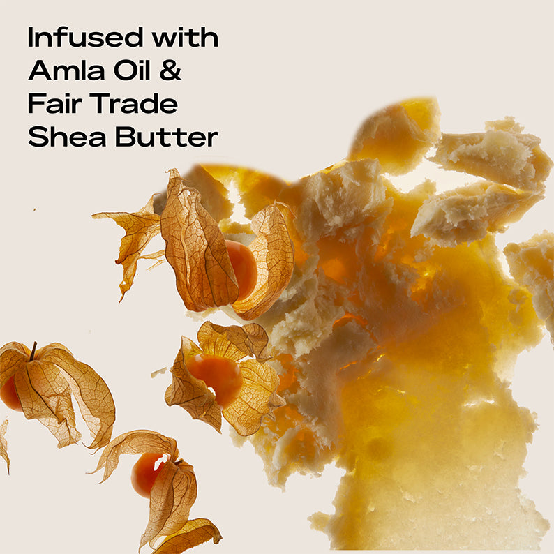 Shea Moisture amla oil bonding treatment showing creamy shea butter chunks and dried amla fruit petals
