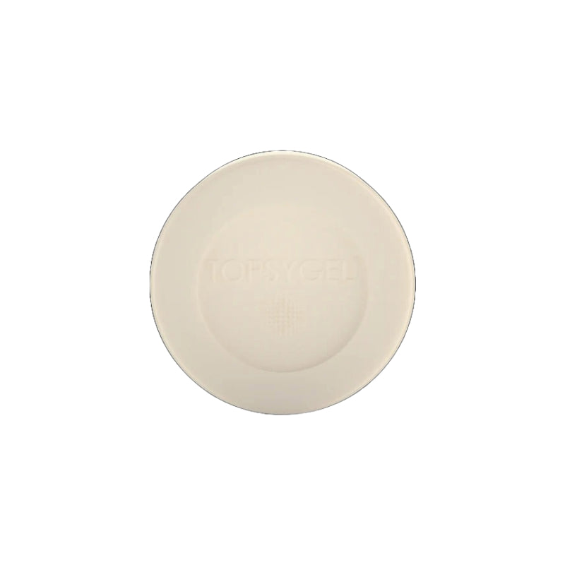 TOPSYGEL round beige bar soap with embossed logo on white background lightening soap for dark spots