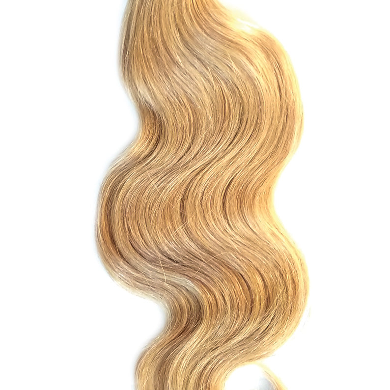 Sensationnel 7A virgin remy hair extensions in blonde with soft natural waves