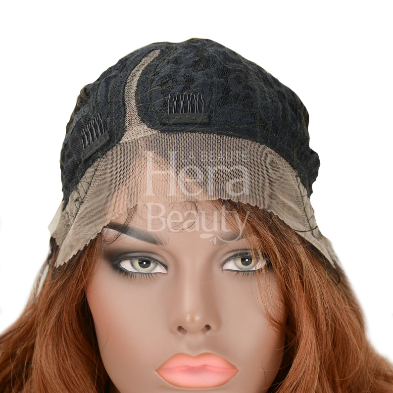 SENSATIONNEL Empress Shear Muse Kanesha lace front wig on mannequin showing lace cap interior and auburn hair