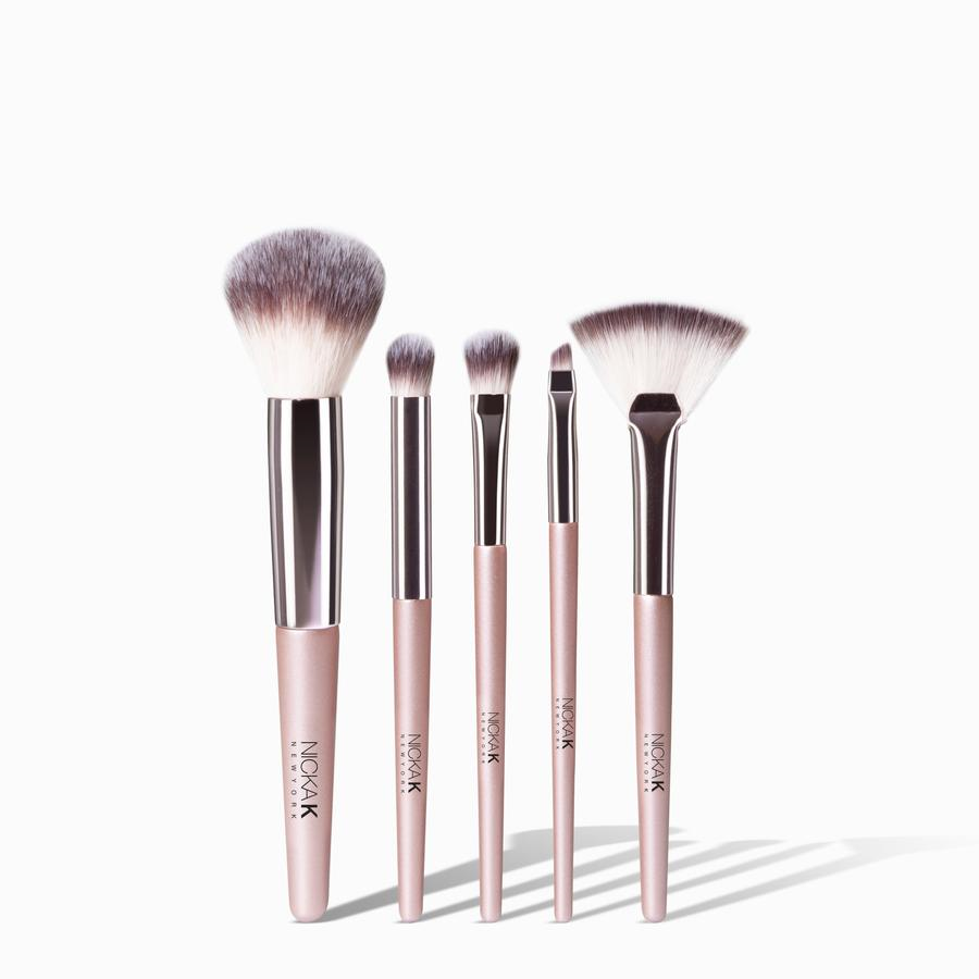 NICKA K face essential brush set five pink handled makeup brushes including powder fan and detail brushes