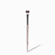 NICKA K powder eyeshadow brush with soft synthetic bristles and pink handle on white background