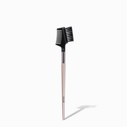 NICKA K lash and brow comb with dual sided black comb and brush on rose gold handle for grooming brows and lashes