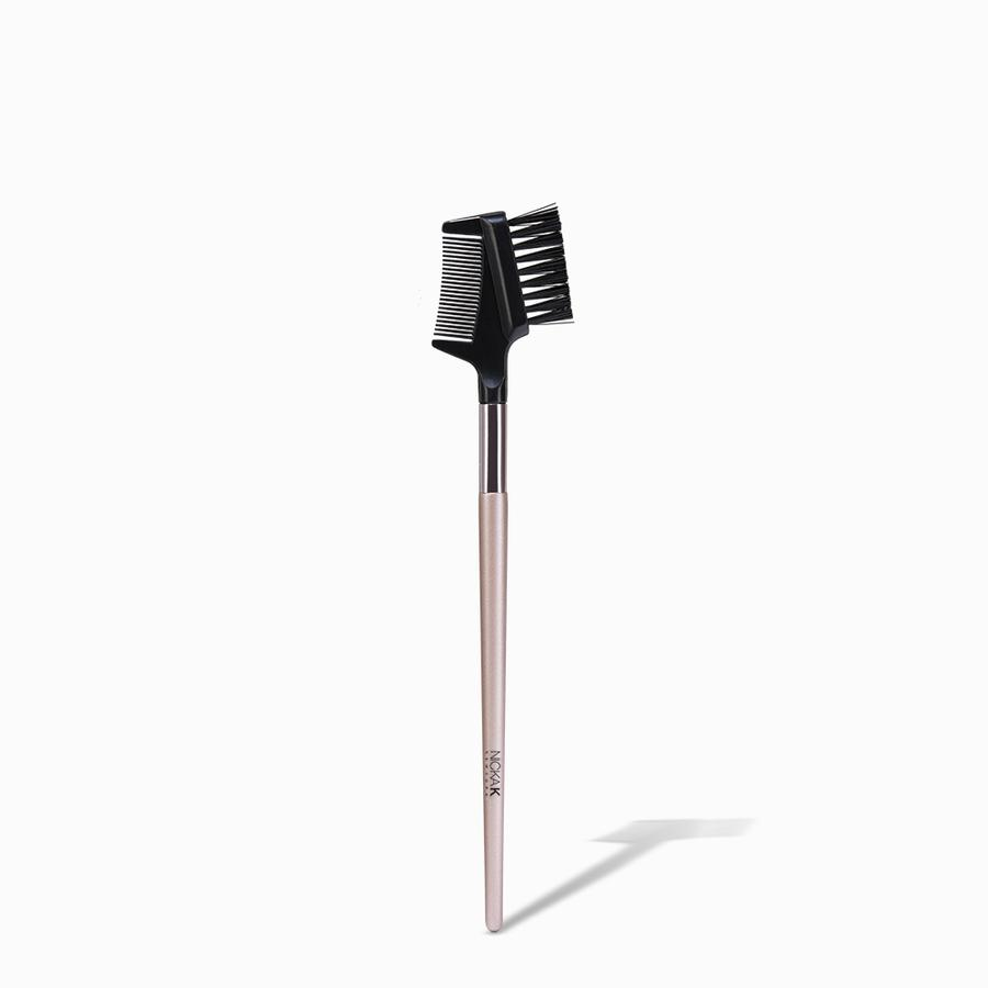 NICKA K lash and brow comb with dual sided black comb and brush on rose gold handle for grooming brows and lashes