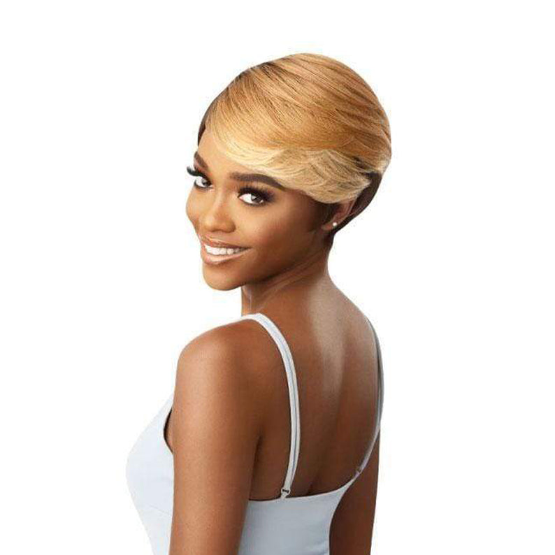 OUTRE 100% human hair full cap wig short blonde sleek pixie with side swept bangs on smiling model