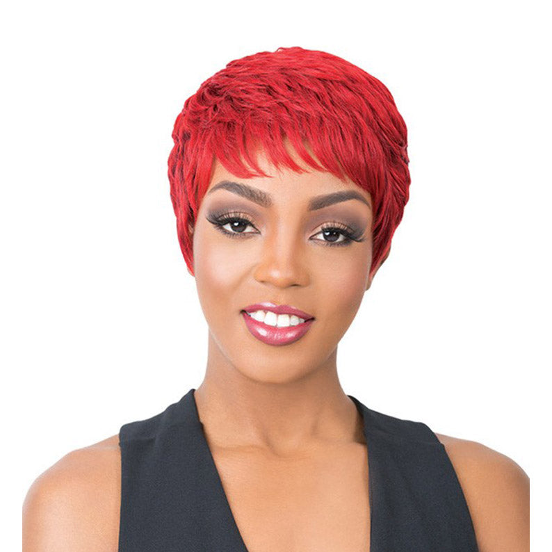 Short red textured pixie synthetic full cap wig on smiling model wearing black top and natural makeup