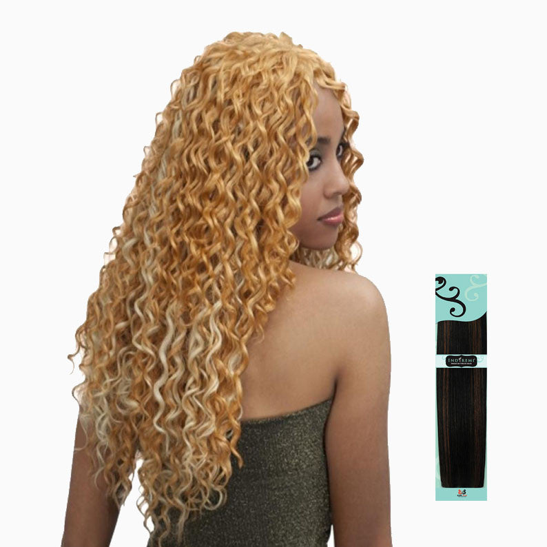 Woman wearing long honey blonde curls and product pack BOBBI BOSS INDI REMI French Wave hair showing texture and length