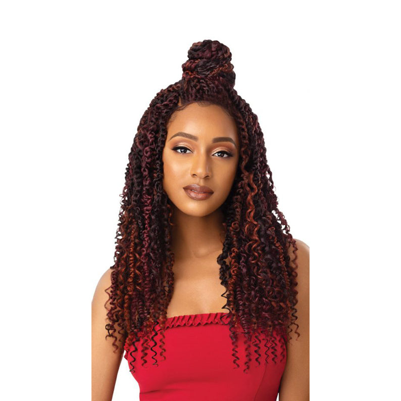 Model wearing OUTRE boho passion waterwave lace front wig in burgundy ombre with half up top knot curls