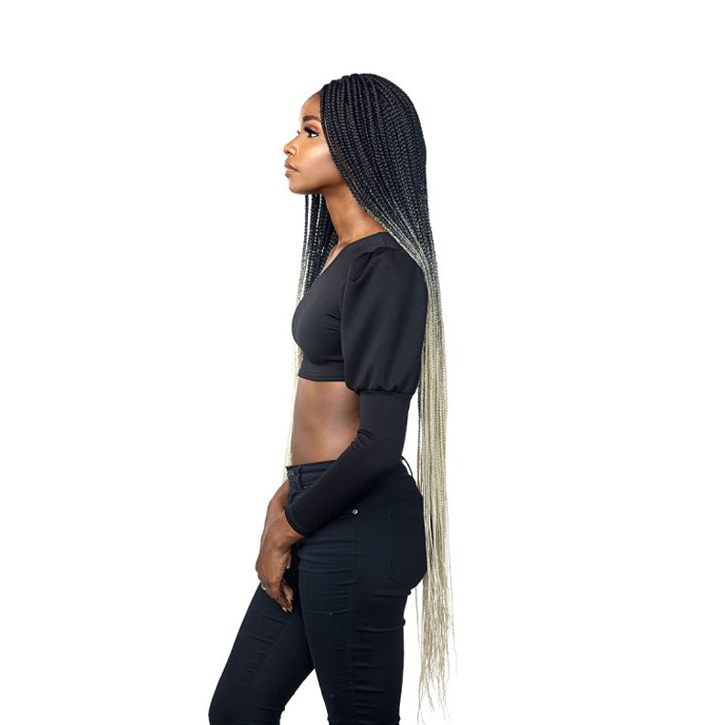 SENSATIONNEL 50 inch box braid lace wig long ombre black to blonde braids worn by model in profile