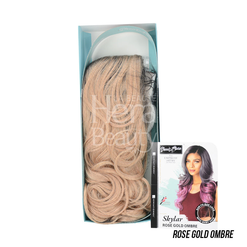 SENSATIONNEL Empress Shear Muse lace front wig in rose gold ombre with loose curls in packaging