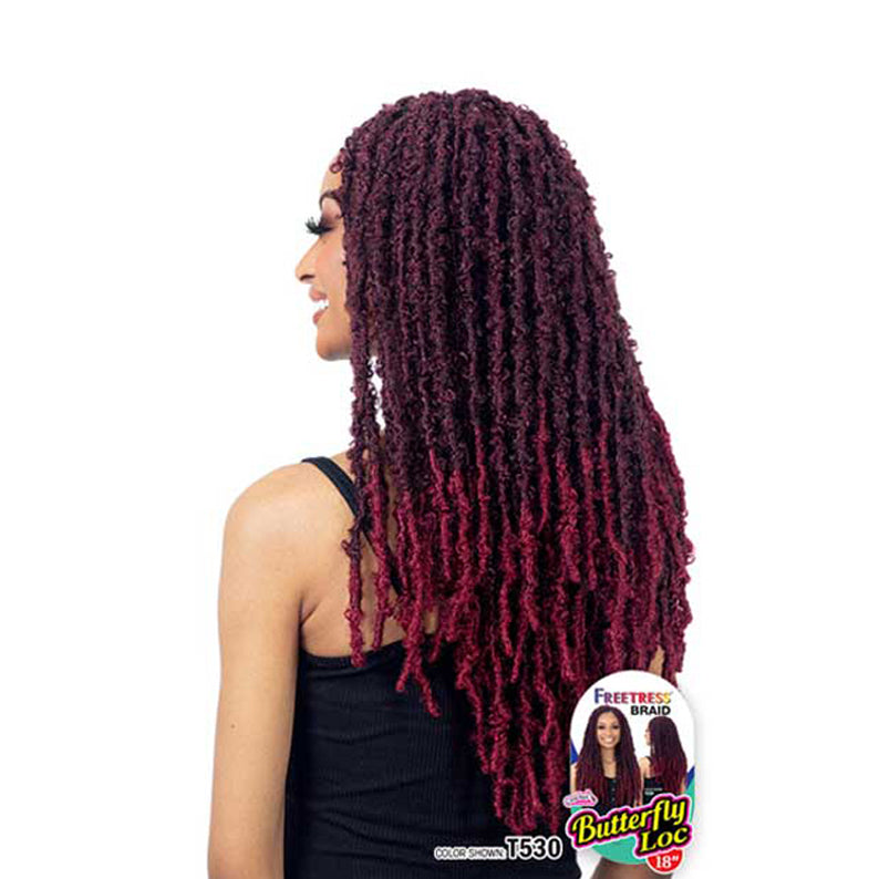 SHAKE N GO butterfly locs hair extensions in burgundy styled on a woman with long curly braids