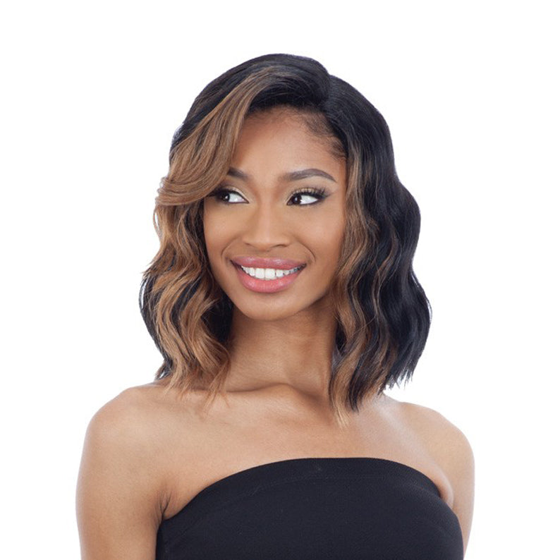 SHAKE N GO model wearing Freetress Equal 5 inch lace part wig wavy shoulder length bob with honey blonde highlights