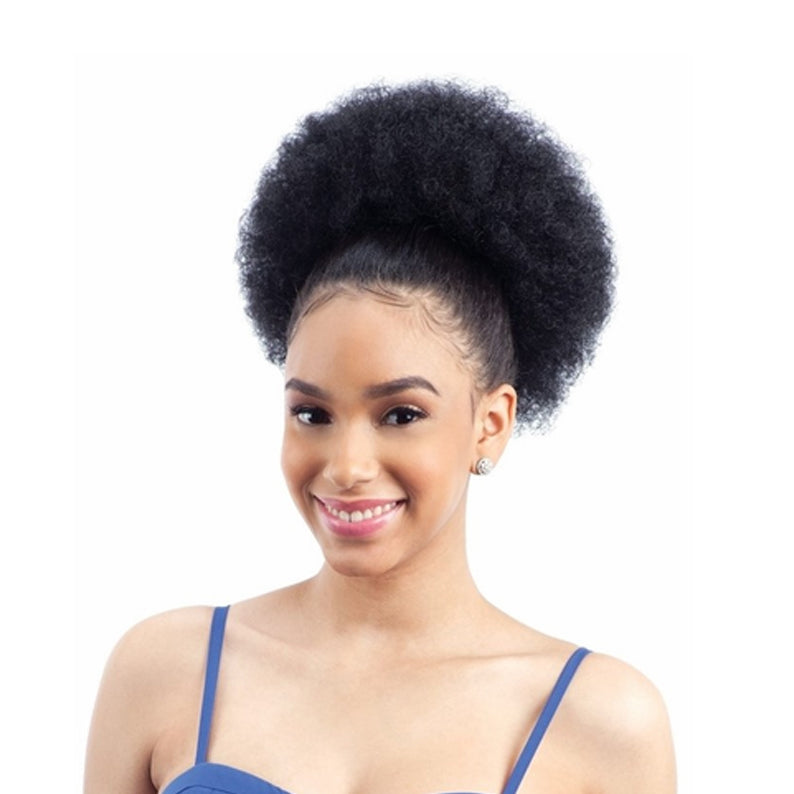 Model wearing a high natural afro ponytail with textured volume Freetress Equal Drawstring Ponytail Puff by SHAKE N GO