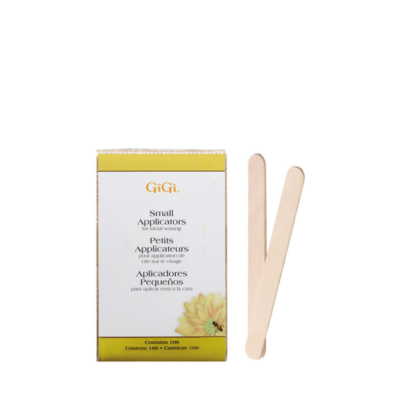GIGI small waxing applicator sticks wooden spatulas next to box for facial and body waxing