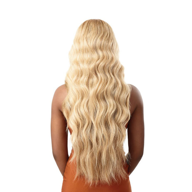 OUTRE 30 inch lace front wig long blonde wavy hair back view on model for styling versatility
