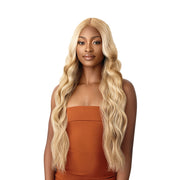 OUTRE 30 inch lace front wig long blonde wavy center part on model for sleek everyday style