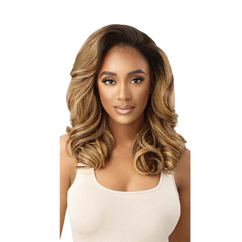 Model wearing OUTRE quick weave half wig honey blonde layered shoulder length curls with dark root and volume