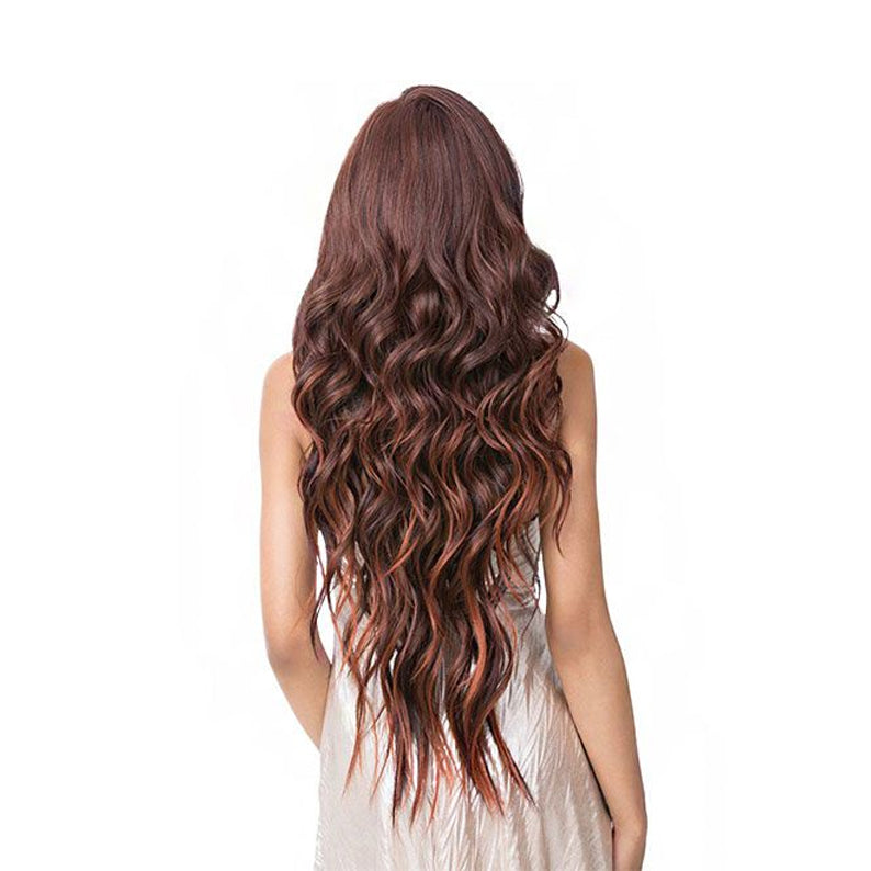 Back view of long wavy brown wig with auburn highlights on model in white dress synthetic 13x6 lace front wig