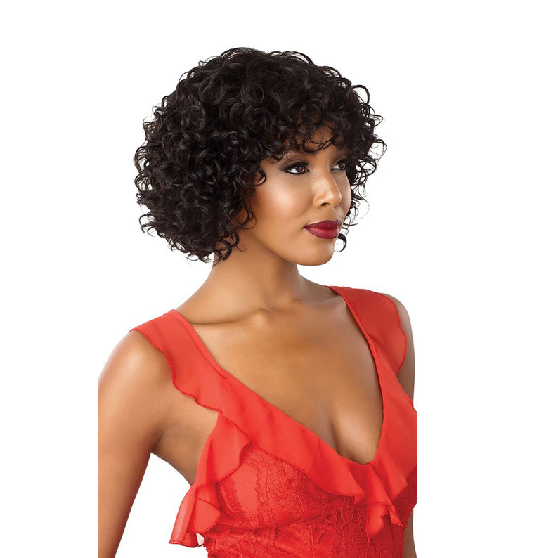 OUTRE 10 inch unprocessed human hair wig short curly black bob with bangs modeled in red dress