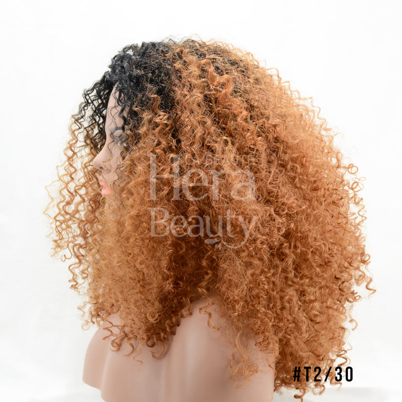 SENSATIONNEL curly ombre wig on mannequin with dark roots and copper ends instant up and down ponytail wig