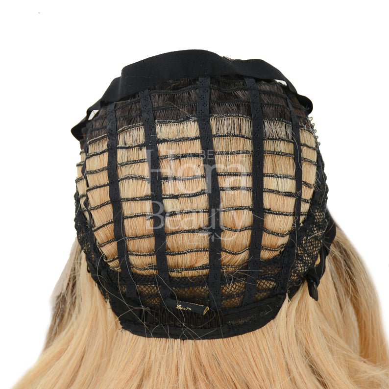 OUTRE melted hairline lace front wig cap interior view showing black mesh cap adjustable straps and blonde wefts