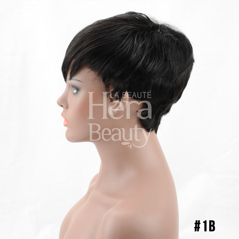 OUTRE human hair pixie wig in 1B natural black short layered pixie cut on mannequin side profile