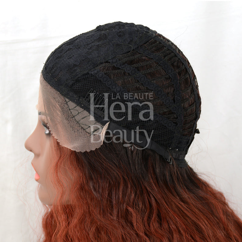 OUTRE lace front synthetic wig with adjustable cap and natural red wavy hair shown on mannequin
