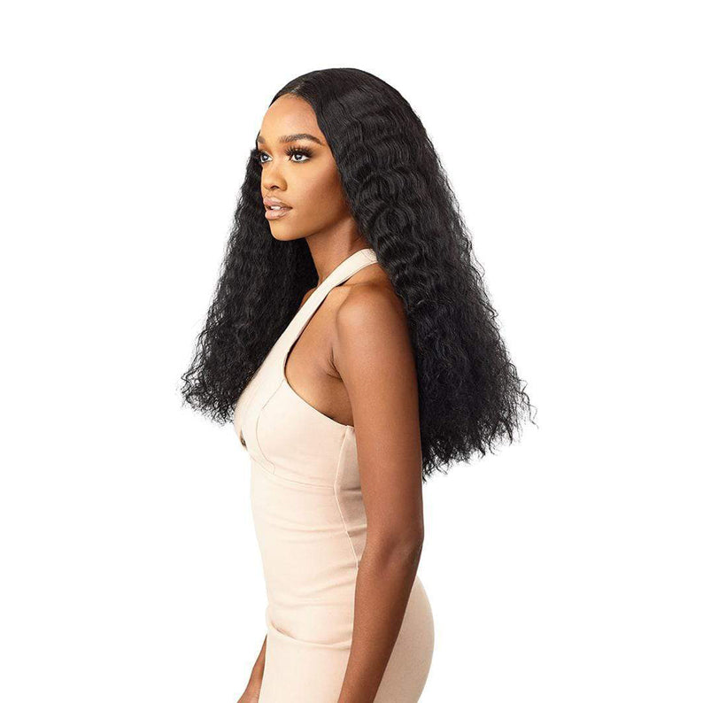 OUTRE lace front synthetic wig long black deep wave center part on model wearing beige dress