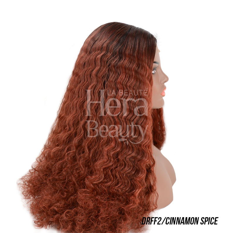OUTRE lace front synthetic wig in cinnamon spice long wavy curly texture on mannequin side profile