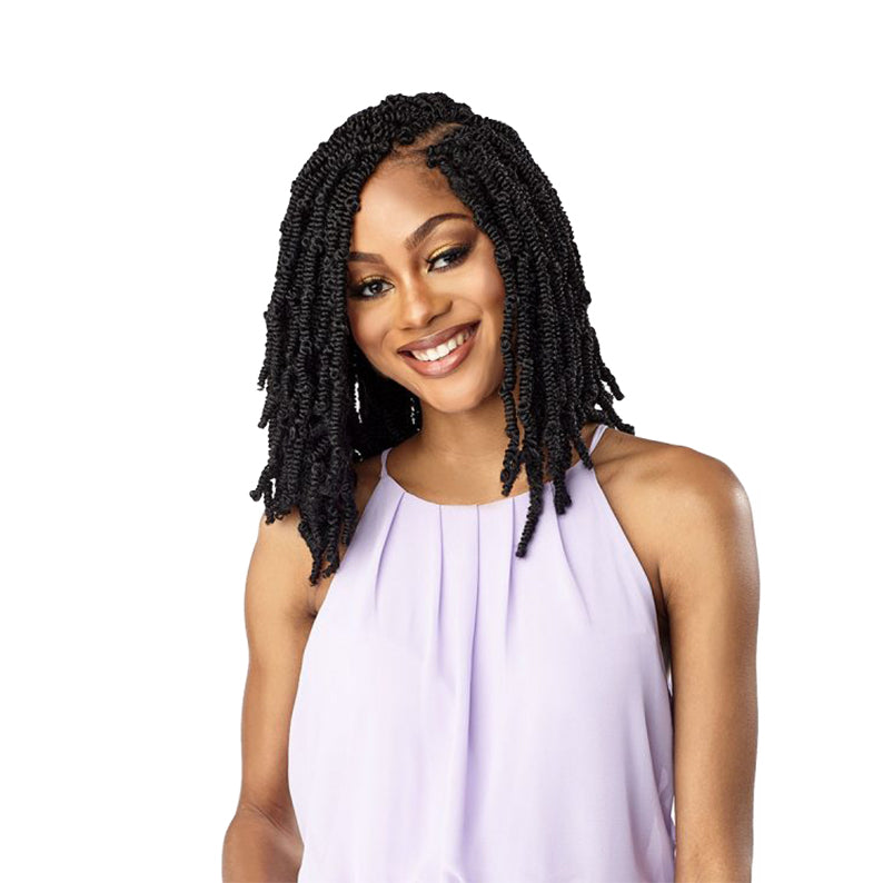 Woman with Sensationnel Lulutress 3X Afro Twist hair wearing a light purple sleeveless top