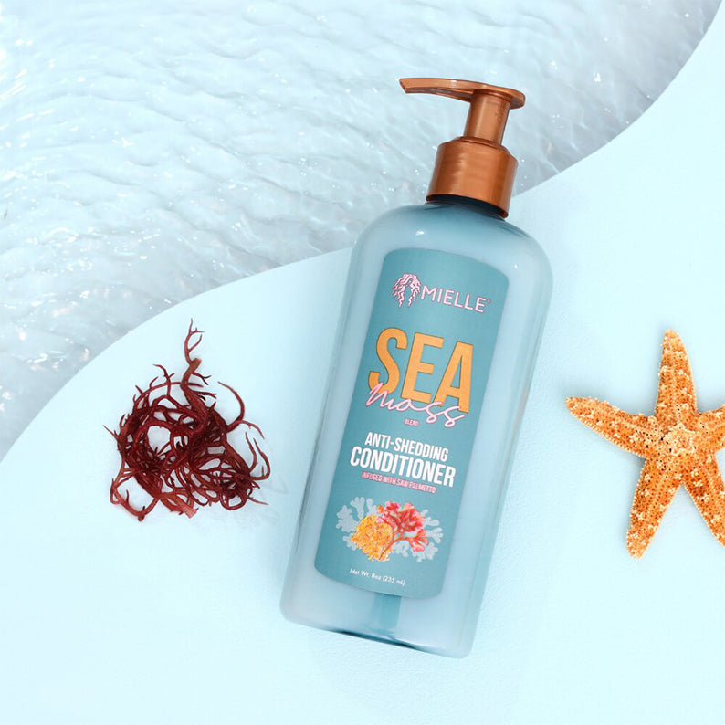 MIELLE sea moss conditioner for natural hair in blue pump bottle labeled anti shedding with starfish styling