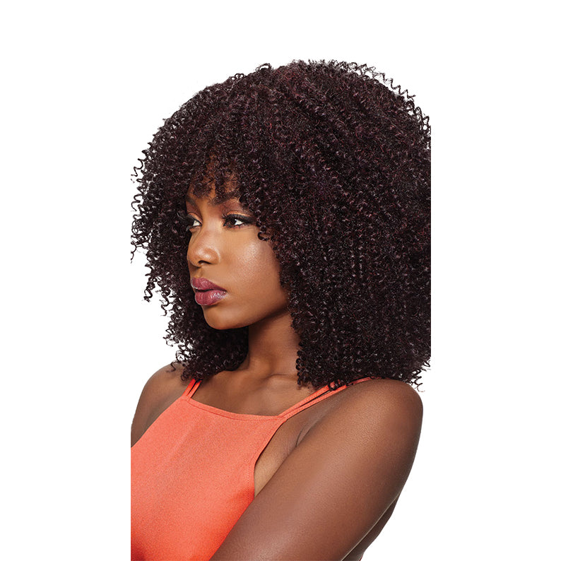 OUTRE braid with dark brown tight curls worn by woman in orange tank top