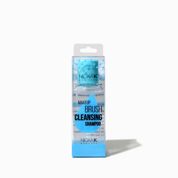 NICKA K makeup brush cleansing kit with clear shampoo bottle and turquoise silicone scrub pad