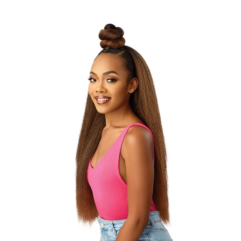 OUTRE converti cap wrap pony half wig long brown textured hair with top knot bun on smiling model