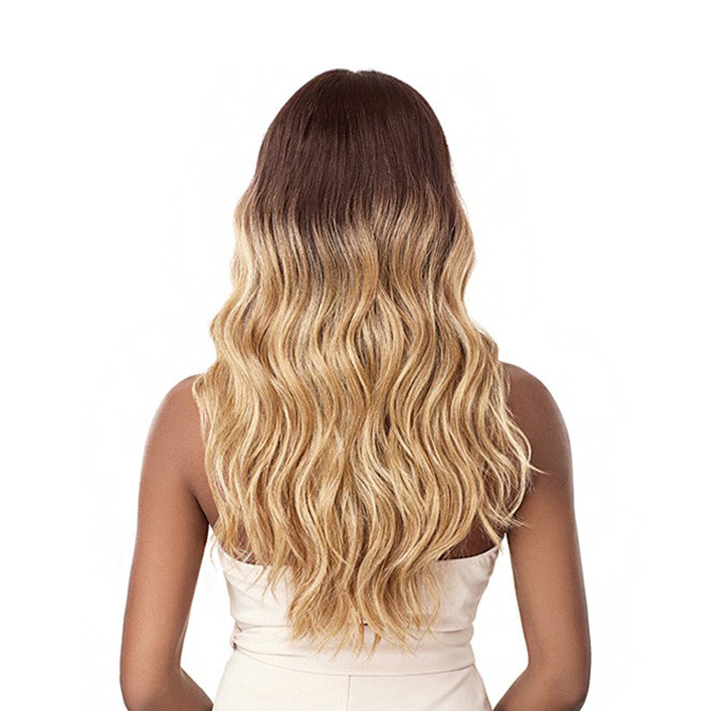 OUTRE lace front synthetic wig 20 inch long wavy ombre brown to blonde shown on model back view