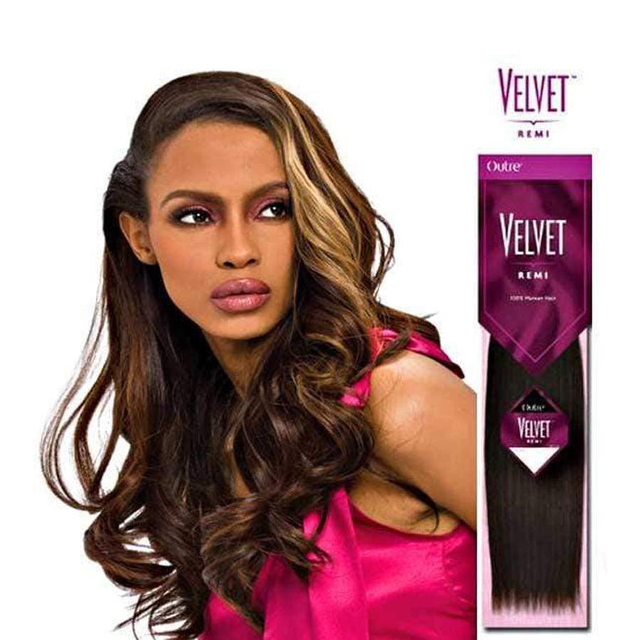 Model with long wavy dark brown hair and blonde highlights in pink next to OUTRE VELVET 100% Remi Human Hair Yaki