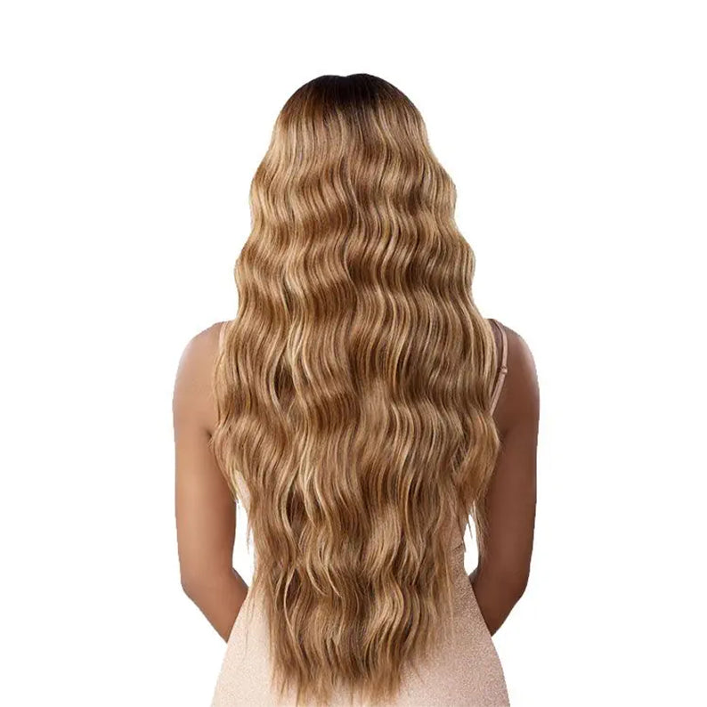 SENSATIONNEL butta lace unit 29 wig long honey blonde wavy lace unit back view with dark roots and soft beach waves