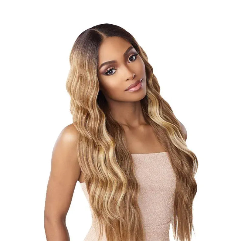 SENSATIONNEL butta lace unit 29 wig long honey blonde wavy lace front with dark root center part on model