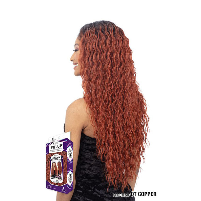 SHAKE N GO model wearing Freetress Equal Level Up HD lace front wig in OT Copper long wavy texture