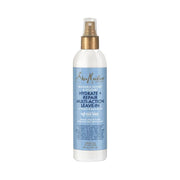 Shea Moisture Manuka Honey Leave-In Conditioner in spray bottle for hydrating and repairing dry hair