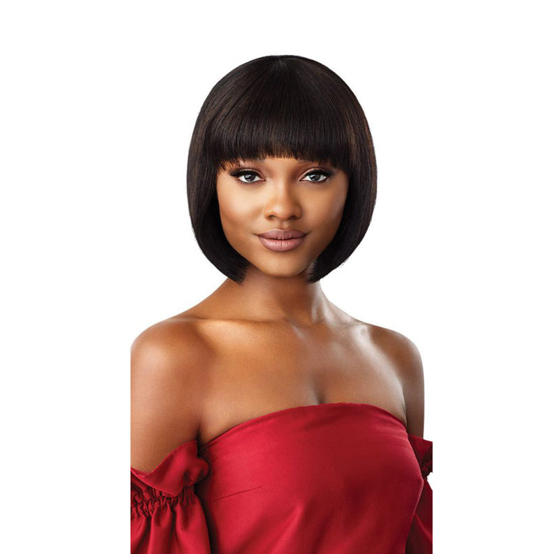 OUTRE 100 human hair bob wig sleek straight chin length with blunt bangs in dark brown on model